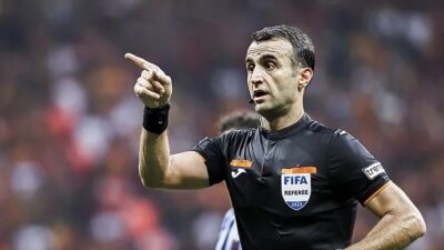 FIFA kokartlı hakem Atilla Karaoğlan, Karadağ'ın Decic ile Galler'in The