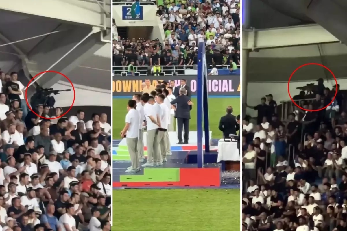 Özbekistan Cumhurbaşkanı Şevket Mirziyoyev, bir futbol stadyumunda katıldığı ödül töreninde