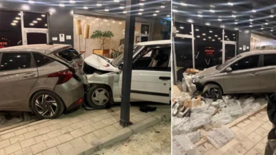 Adana'da meydana gelen kazada iki otomobil peş peşe bir mağazaya