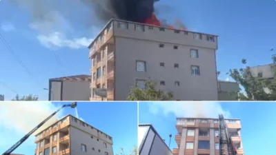 İstanbul Ataşehir'de bir binanın çatısında çıkan yangın, itfaiye ekipleri tarafından