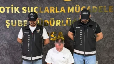 Bursa'da düzenlenen şafak operasyonunda, Interpol tarafından aranan uyuşturucu kaçakçısı Aydan
